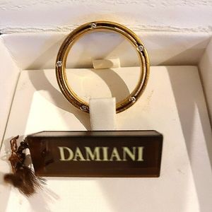 18k gold men's or women's ring designed by Damiani and Brad Pitt.